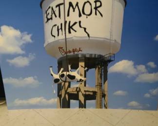 "Eat More Chicken" sign