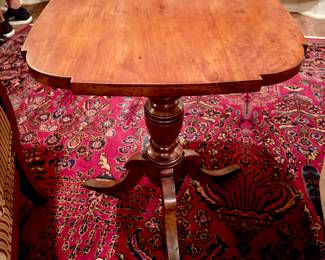 Antique tilt top table
