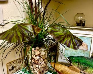 Custom greenery in shell filled vases