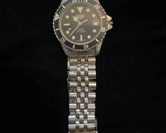 007-JR: Heuer Men’s 980.013 Calendar/Diver Wristwatch