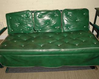 Vintage glider with period cushions