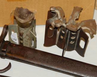 two fragments of German incendiary bombs - found in England