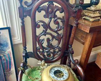 Ornate antique chair (needs repair) and antique hanging clock