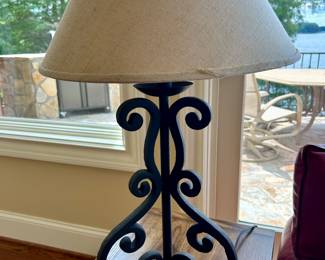 (matching pair of heavy iron lamps)