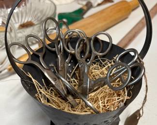 8 school scissors in a tin bucket….. oh the days when kids learned how not to cut themselves the hard way….