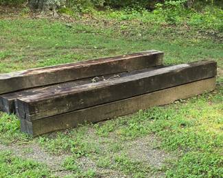 One of two stacks of 6” by 8” 8ft railroad cross ties