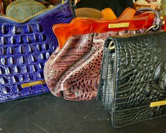 Three Brahmin clutches with straps to use as crossbody bags