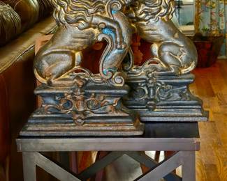 Large metal lions to use as fireplace accents or as you wish