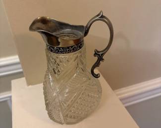 antique cut glass syrup pitcher with silver plated top 