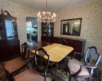 Dining table with 6 chairs, leaf, and pads