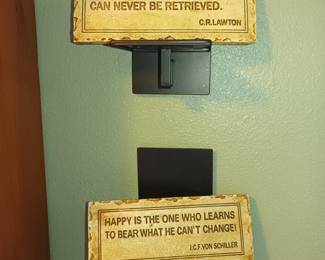 Great sayings immortalized in faux stone plaques