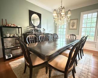 dining table with 12 chairs , sideboard, candles