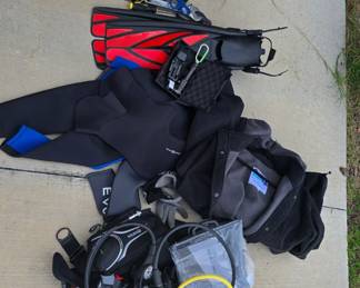 Diving gear: BCD, split fins and solid rubber fins, 2-3 mil wet suit, dive jacket.