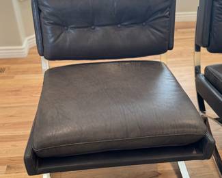 Modern leather and chrome tufted chairs from Gatehouse. 2 available