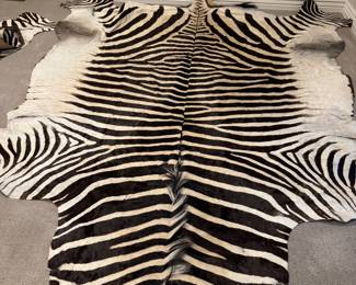 Zebra skin rug. 2 available