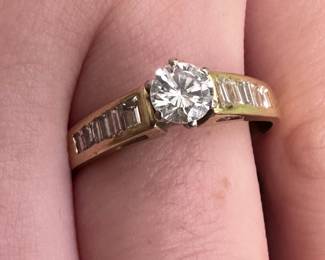 14 Kt .60 Ct center stone total ct weight approx .90. $1350