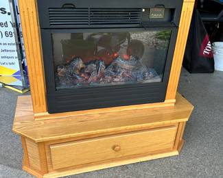 Heat Surge Amish wood portable electric fireplace. Look closely, you can see the flames glowing!