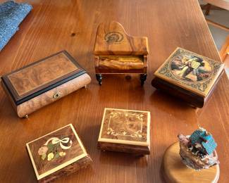 Various music boxes, including Walnut Burl Regue box, Sorrento Italy wood inlaid boxes, Moses and the 10 Commandments Reco music box,