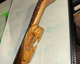 Carve folk art walking stick with snake fangs! Very cool!!