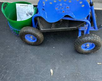 Garden cart with swivel seat.