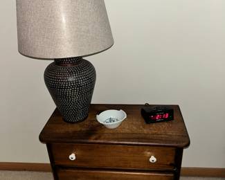 Two drawer end table and lamp.