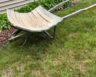 An excellent vintage wheelbarrow.