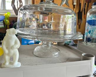 A close-up of the glass pedestal with cover.