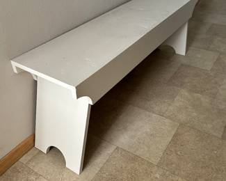 Long white bench.