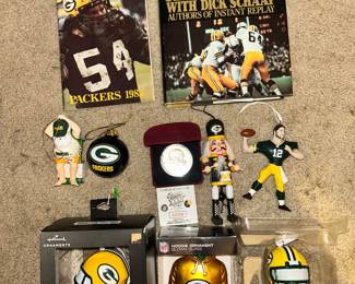 Jerry Kramer’s  signed autograph of his hardcover book ‘Distant Replay’, Packers 1983 information book. 1997 GBP Super Bowl XXXI coin in case. Two GBP Hallmark bobble head Christmas ornaments and a few other select Packers Christmas tree ornaments. Go Pack Go!!!
