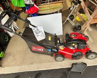 Toro self-propelled TXP 159 cc lawnmower.