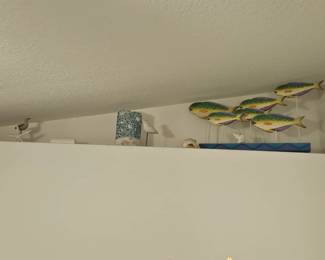 Metal fish art $45 you'll need a ladder to get up there