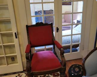 Carved red velvet chair