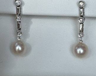 $300 - Pearl & diamonds 14kt white gold earrings with 3 small round diamonds. 3.1 grams.