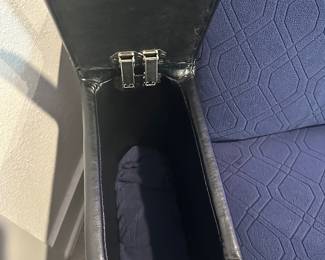 #56 - $400 - Black leather theater recliner with all kind of gadgets & lights effect. Client kept the protective cover on. (approx 2 years old) Mint condition