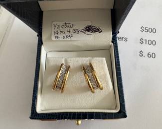$400 - Pair of 14kt yellow gold 1/2 loop 1/2 ctw diam. 4.3gr