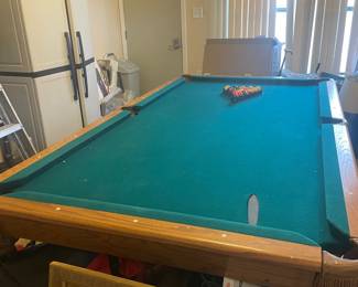 Pool table $650 with pool ques and stand