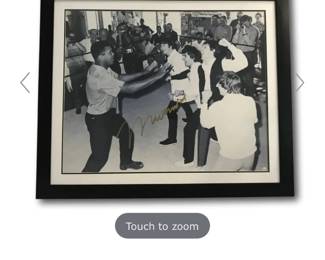 Muhammad Ali and Beatles sign photos. Compare on Internet at $10,000.
Highest offer