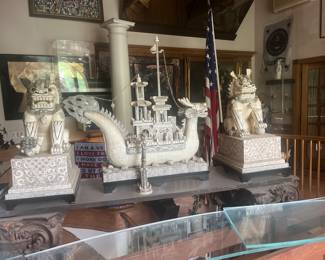 Two food dogs and one giant ship hand carved value in excessive $40,000 highest offer
