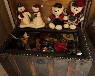 embossed metal steamer trunk, curved lid, mirrored inside