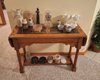 Oak sofa table with collectables