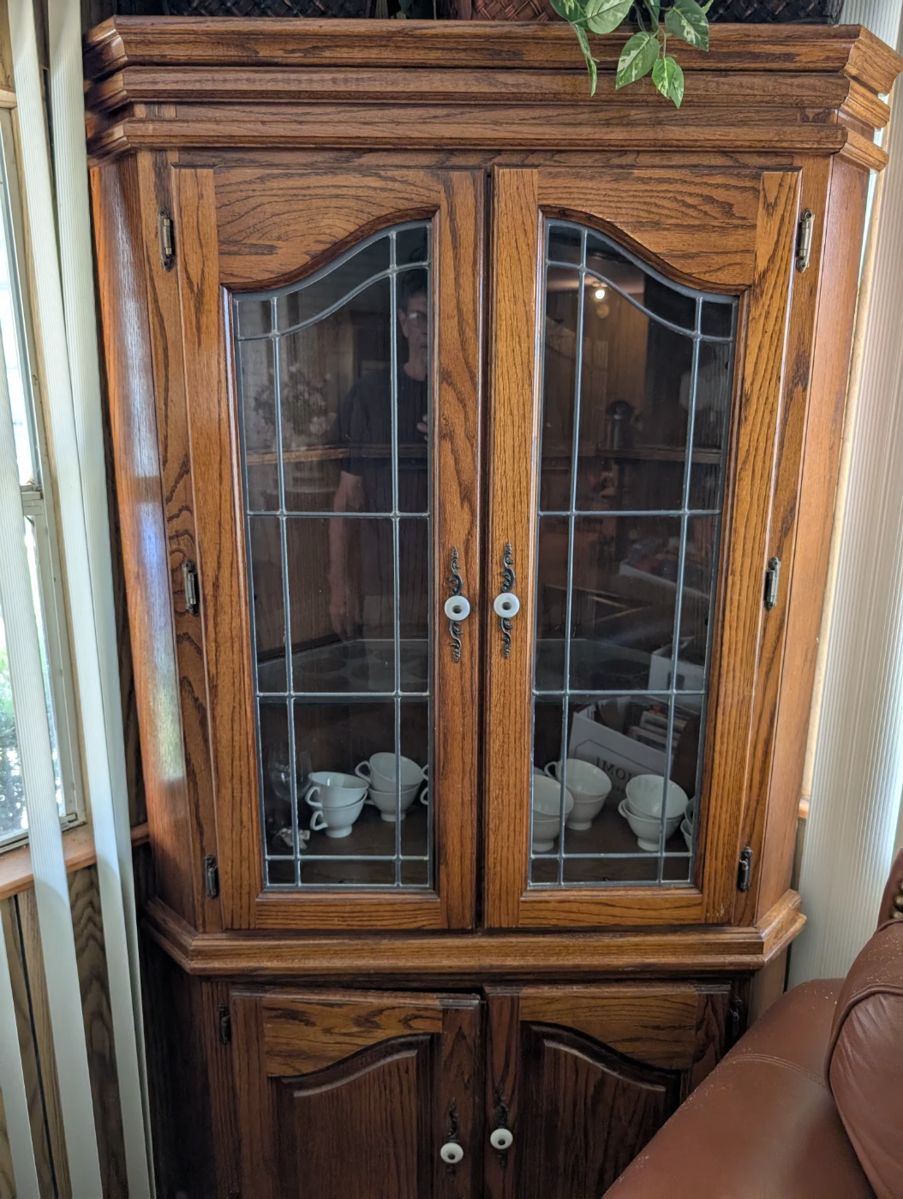 Curio cabinet, contents sold separately.