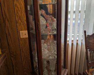 Another curio cabinet contents sold separately.