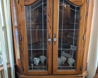 Curio cabinet, contents sold separately.