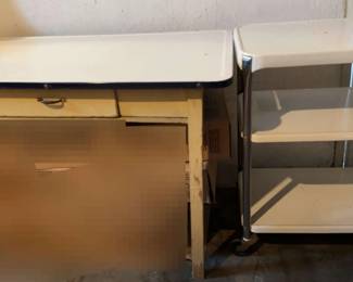 Enameled Top Table And Rolling Shelves On Casters