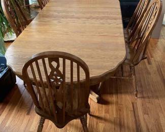 Amish Solid Wood Dining Table With 2 Extensions And 6 Chairs