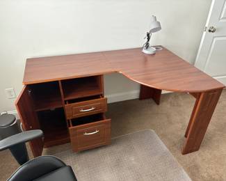 Desk in office
Length: 58.5 in
Height: 30 in
Width: 38.5 in