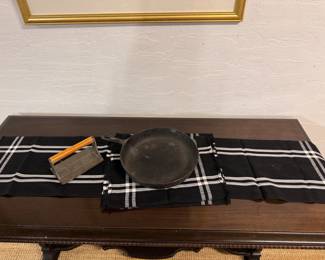 Large cast iron skillet and grill weight