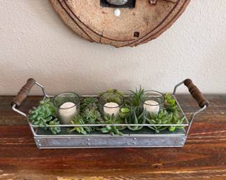Tray of faux cacti and candles