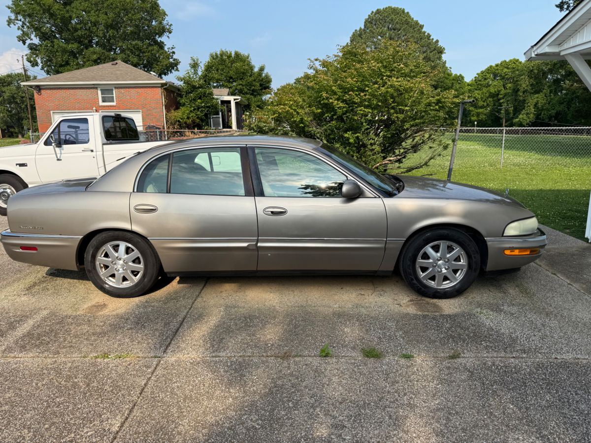 2004 Buick Park Avenue with only 98,300 miles. Runs great, new battery, cold A/C.