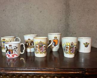 Lots of commemorative china- cups and plates.